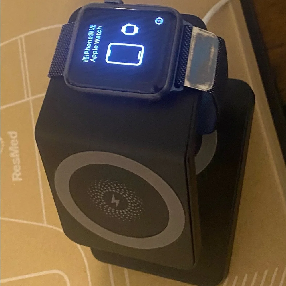 Apple Smartwatch with Black Band and Charger